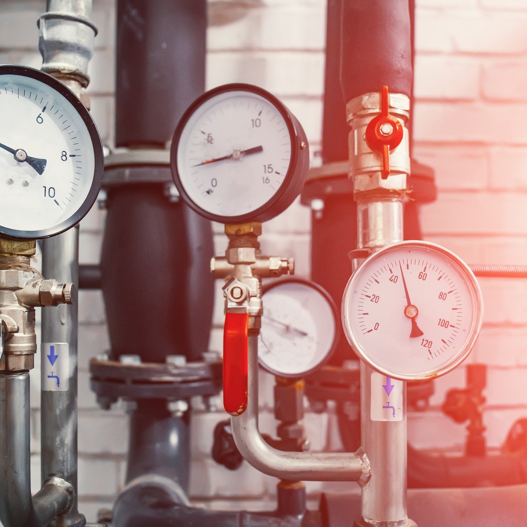 House heating system with many steel pipes, manometers and metal tubes